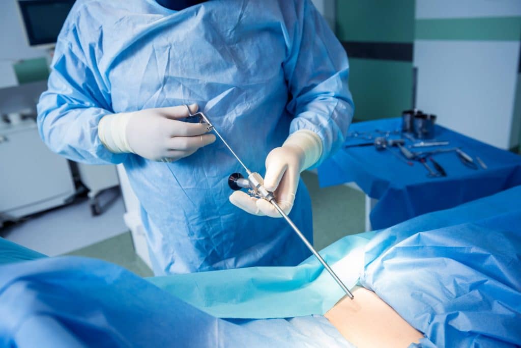 Surgeon performing endoscopic microdiscectomy
