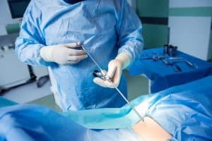 Surgeon performing endoscopic microdiscectomy